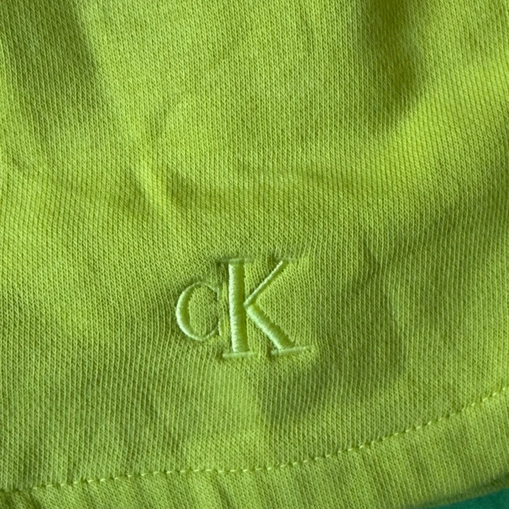 Calvin Klein Women's Athletic Yellow Shorts - Picture 4 of 5